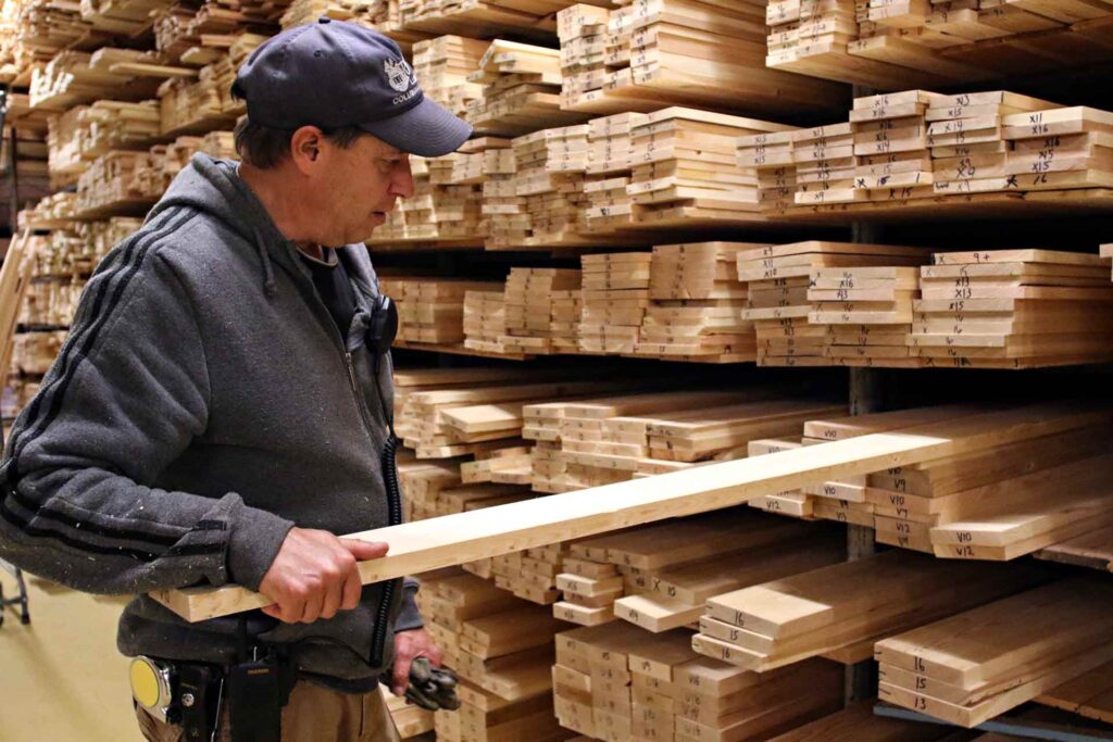 What Happened to Montana’s Forestry Jobs? 1 Roy Thompson shows vertical grain boards at RBM Lumber in Columbia Falls, Montana. (AP Photo/Flathead Beacon, Greg Lindstrom)