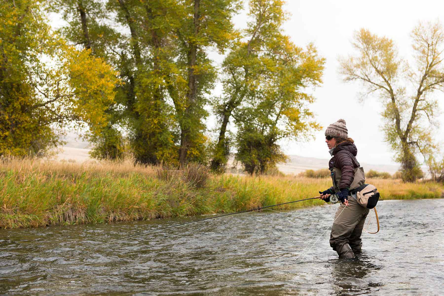Erin McCleary fishes a small stream near Butte, Montana. (Bozeman Daily Chronicle)